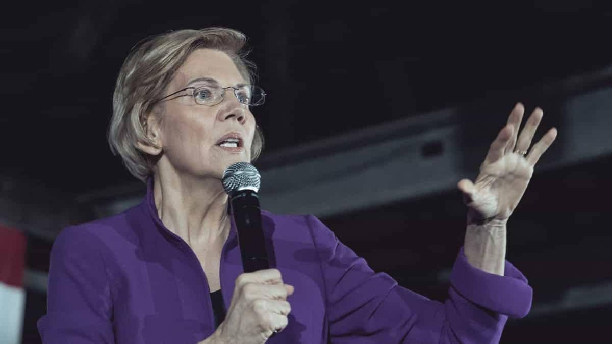 Warren Targets OCC Over Crypto Bank Charters as 9 Firms Face Regulatory Firestorm